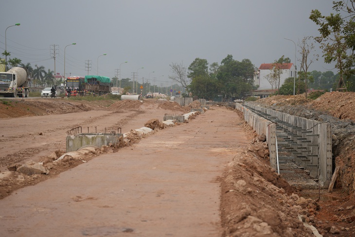 Tiến độ mở rộng quốc lộ nối 2 quận, huyện Hà Nội sau 2 năm thi công- Ảnh 7.