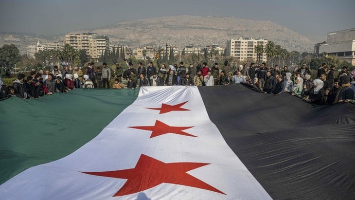 Chính phủ chuyển tiếp chính thức hoạt động tại Syria- Ảnh 1. Chính phủ chuyển tiếp chính thức hoạt động tại Syria- Ảnh 1.