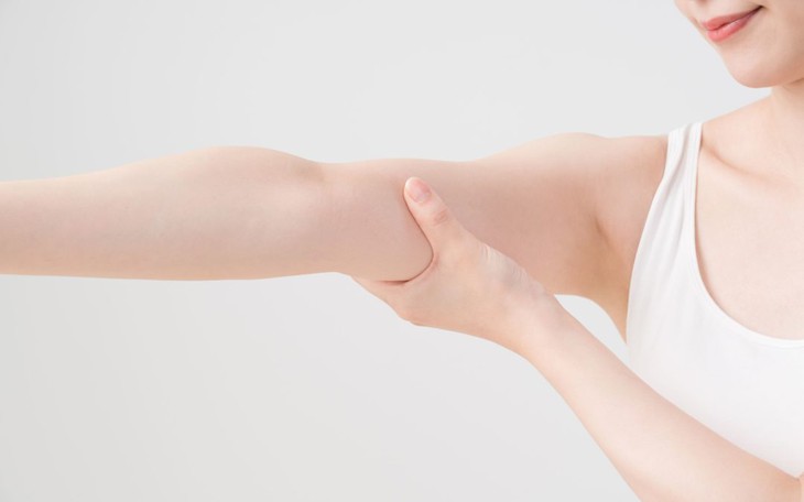 asian-woman-self-massage-arm-1080x675
