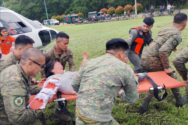 Số nạn nhân thiệt mạng do lở đất tại Philippines tăng lên 37 người- Ảnh 1. Số nạn nhân thiệt mạng do lở đất tại Philippines tăng lên 37 người- Ảnh 1.