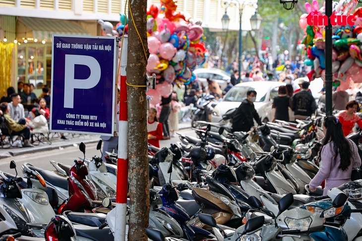 Mạnh tay xử phạt vi phạm trông giữ xe ngày Tết- Ảnh 9.