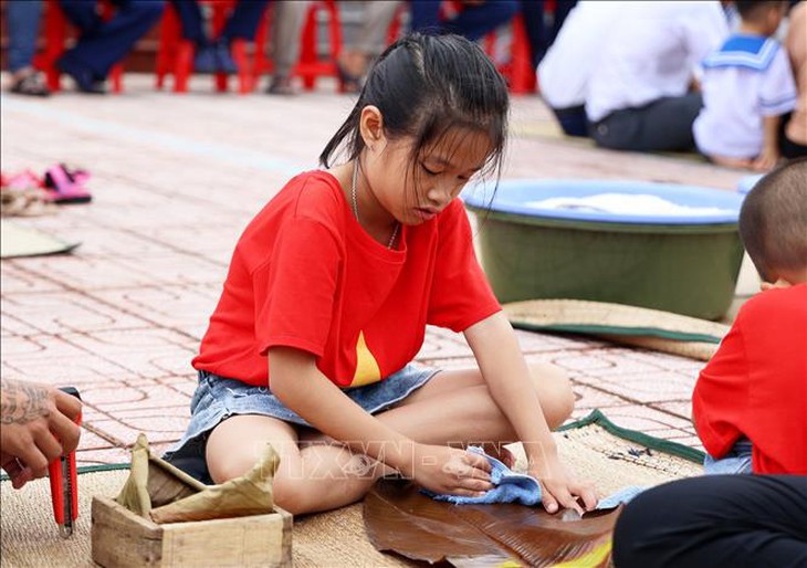 Quân dân ở Trường Sa thi gói bánh chưng đón Tết- Ảnh 3. Quân dân ở Trường Sa thi gói bánh chưng đón Tết- Ảnh 3.