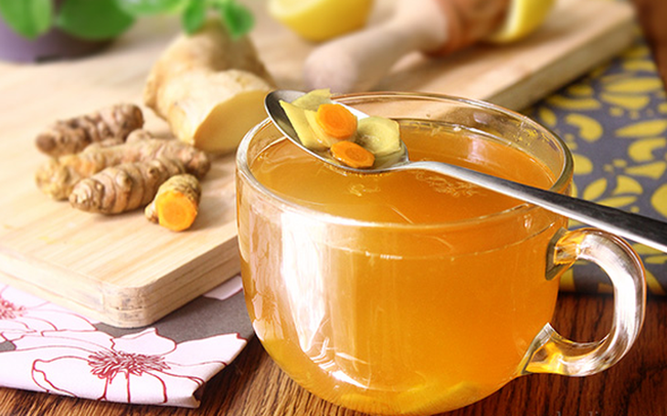 Nước gừng nghệ giúp giảm cân như thế nào?
