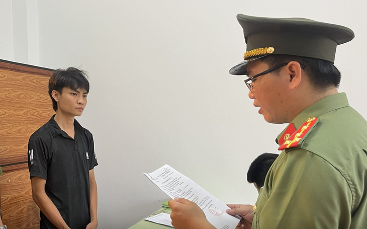 Bắt nam thanh niên mua tiền giả để tiêu thụ- Ảnh 1.