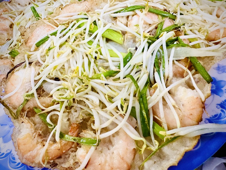 Khám phá hương vị đặc trưng và giá trị dinh dưỡng của bánh xèo tôm nhảy Quy Nhơn- Ảnh 1. Khám phá hương vị đặc trưng và giá trị dinh dưỡng của bánh xèo tôm nhảy Quy Nhơn- Ảnh 1.