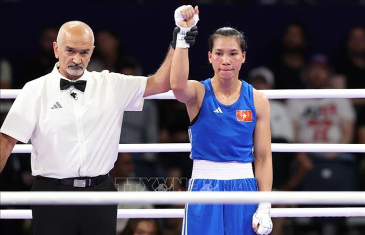 Olympic 2024: Nữ võ sĩ Hà Thị Linh chiến thắng trước đối thủ người Tonga- Ảnh 5. Olympic 2024: Nữ võ sĩ Hà Thị Linh chiến thắng trước đối thủ người Tonga- Ảnh 5.