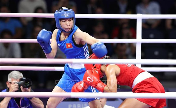 Olympic 2024: Nữ võ sĩ Hà Thị Linh chiến thắng trước đối thủ người Tonga- Ảnh 2. Olympic 2024: Nữ võ sĩ Hà Thị Linh chiến thắng trước đối thủ người Tonga- Ảnh 2.