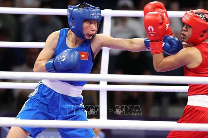 Olympic 2024: Nữ võ sĩ Hà Thị Linh chiến thắng trước đối thủ người Tonga- Ảnh 3. Olympic 2024: Nữ võ sĩ Hà Thị Linh chiến thắng trước đối thủ người Tonga- Ảnh 3.