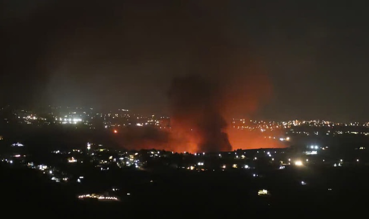Israel-Hezbollah tiếp tục không kích lẫn nhau- Ảnh 1.