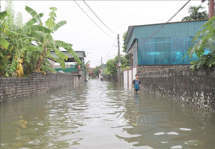 Sạt lở đất do mưa lớn diễn biến phức tạp ở nhiều địa phương miền núi- Ảnh 1. Sạt lở đất do mưa lớn diễn biến phức tạp ở nhiều địa phương miền núi- Ảnh 1.