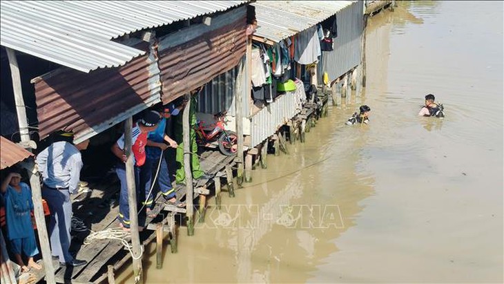 Tìm thấy thi thể bé trai hơn 4 tháng tuổi rơi xuống kênh xáng Xẻo Rô- Ảnh 1.