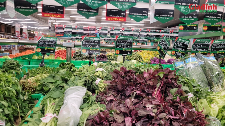 Bão số 11 gây mưa lớn, ngập diện rộng, rau xanh có loại vẫn giữ giá 13.500 đồng/kg- Ảnh 2.