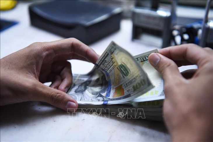 Tỷ giá hôm nay 27/11: Điều chỉnh tăng giá bán ra USD và NDT- Ảnh 1.