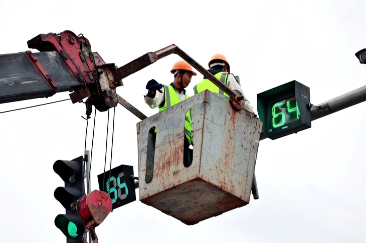 Vì sao đèn đếm lùi tại nhiều nút giao Hà Nội ngừng hoạt động?- Ảnh 2. Vì sao đèn đếm lùi tại nhiều nút giao Hà Nội ngừng hoạt động?- Ảnh 2.