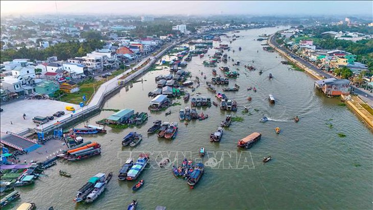 Truyền thông nước ngoài phản ánh bức tranh cuộc sống trên chợ nổi Cái Răng- Ảnh 1. Truyền thông nước ngoài phản ánh bức tranh cuộc sống trên chợ nổi Cái Răng- Ảnh 1.
