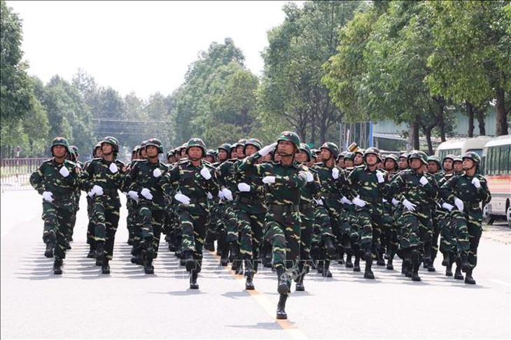 Quân đội Lào và Campuchia tập luyện tại Bình Dương, chuẩn bị cho lễ diễu binh- Ảnh 5. Quân đội Lào và Campuchia tập luyện tại Bình Dương, chuẩn bị cho lễ diễu binh- Ảnh 5.