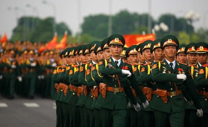 Quy định mới nhất về mức đóng BHYT đối với lực lượng QĐND, CAND, người làm công tác cơ yếu- Ảnh 1.
