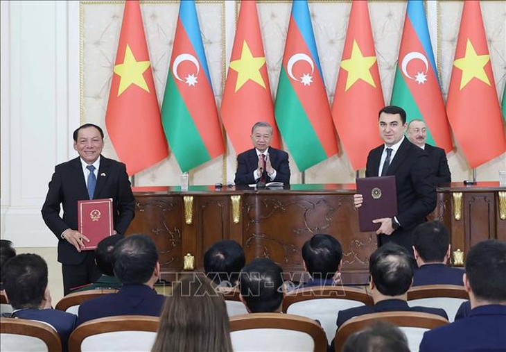 Tổng Bí thư Tô Lâm chứng kiến Lễ trao các văn kiện hợp tác Việt Nam - Azerbaijan- Ảnh 1.