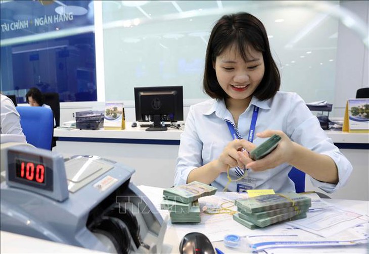 Tiếp tục giảm lãi suất, hỗ trợ tăng trưởng kinh tế cuối năm- Ảnh 1.