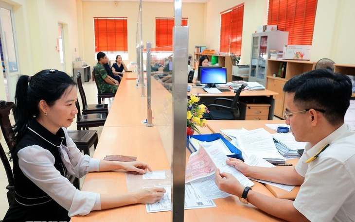 Không chấp hành nộp phạt vi phạm giao thông sẽ bị cưỡng chế khấu trừ lương, tài khoản- Ảnh 2.