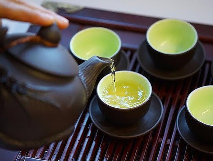 Chén trà xanh tiếp khách đầu năm: Bí quyết chống lão hóa và ngăn ngừa tích mỡ bụng- Ảnh 2. Chén trà xanh tiếp khách đầu năm: Bí quyết chống lão hóa và ngăn ngừa tích mỡ bụng- Ảnh 2.