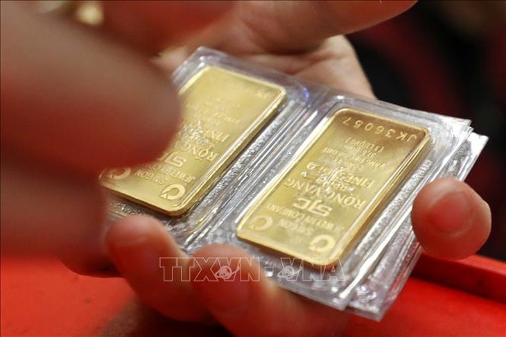 Giá vàng miếng sáng 31/1 giảm 9 triệu đồng/lượng- Ảnh 1.
