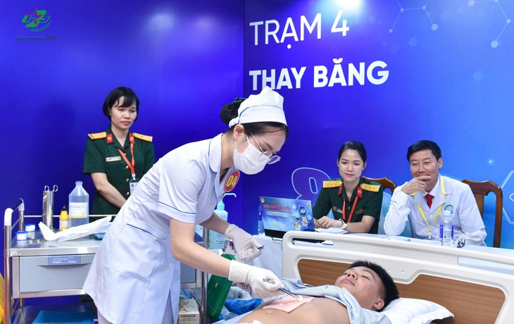 Gần 100 điều dưỡng Quân y tranh tài tại Hội thi Điều dưỡng giỏi năm 2026- Ảnh 2. Gần 100 điều dưỡng Quân y tranh tài tại Hội thi Điều dưỡng giỏi năm 2026- Ảnh 2.