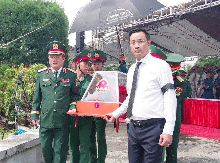 Truy điệu, an táng 14 hài cốt liệt sĩ tại Hội An- Ảnh 1.