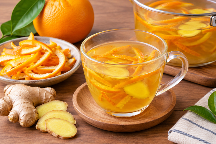 4 lợi ích tiềm năng của nước vỏ cam nấu với gừng - Ảnh 1.
