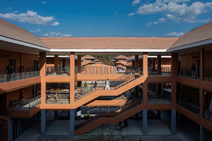 A building with a roof and stairs  AI-generated content may be incorrect.