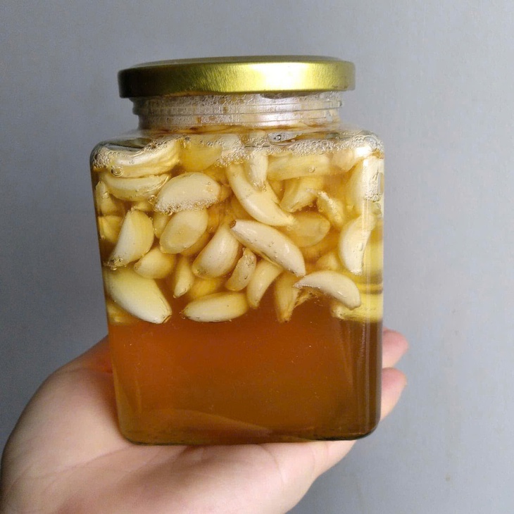 4 tác hại của tỏi ngâm mật ong ít ai biết- Ảnh 1.