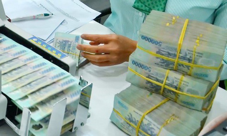Ngân hàng đồng loạt giảm lãi suất, áp lực thanh khoản hạ nhiệt- Ảnh 1.