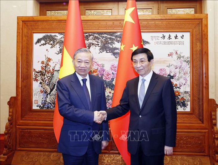Tổng Bí thư, Chủ tịch nước Tô Lâm hội kiến Chủ tịch Chính hiệp toàn quốc Trung Quốc Vương Hộ Ninh- Ảnh 1.