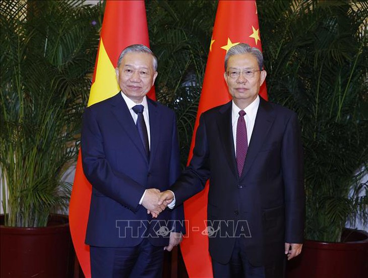 Tổng Bí thư, Chủ tịch nước Tô Lâm hội kiến Ủy viên trưởng Nhân đại toàn quốc Trung Quốc - Ảnh 2.