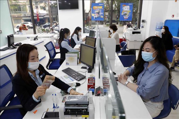 Lãi suất ngân hàng tiếp tục nhích tăng- Ảnh 1.