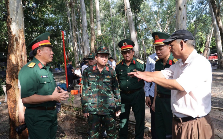Nhân chứng tiết lộ cảnh tượng ám ảnh về mộ tập thể liệt sĩ tại Công viên Lê Thị Riêng - Ảnh 1.