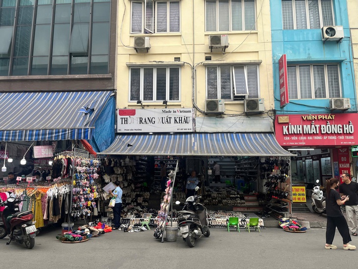 Hà Nội xem xét giải tỏa chợ Nhà Xanh và quy hoạch mở rộng đường Phan Văn Trường - Ảnh 2.