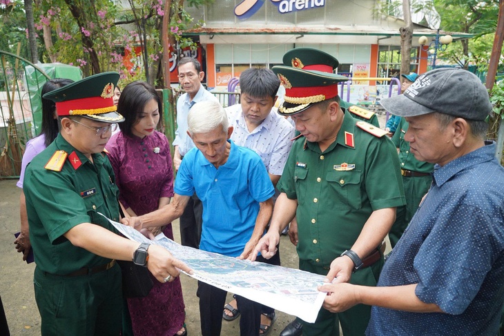 Nhân chứng tiết lộ cảnh tượng ám ảnh về mộ tập thể liệt sĩ tại Công viên Lê Thị Riêng - Ảnh 1.