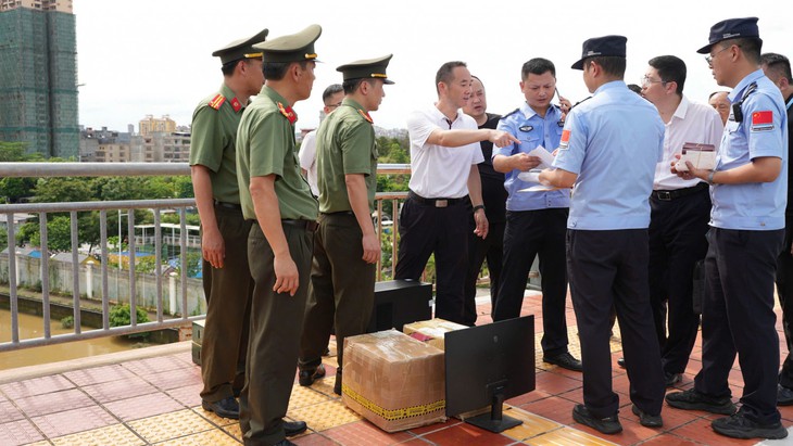 Quảng Ninh bàn giao 30 đối tượng lừa đảo công nghệ cao cho công an Trung Quốc- Ảnh 3.