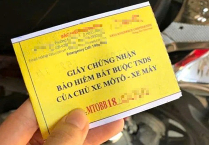 Bộ Tài chính lý giải việc không bỏ bảo hiểm bắt buộc xe máy- Ảnh 1.