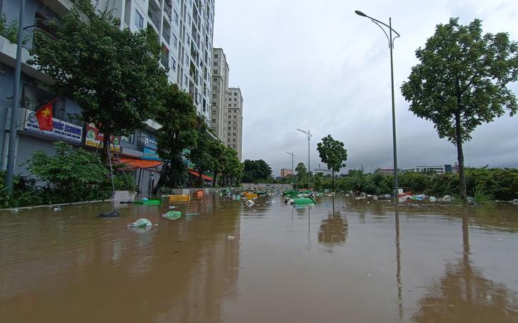 Vùng áp thấp bất ngờ mạnh lên thành áp thấp nhiệt đới trên Biển Đông - Ảnh 2.