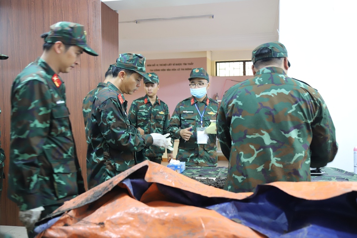 Hình ảnh công tác quy tập hài cốt liệt sĩ tại Công viên Lê Thị Riêng- Ảnh 11.