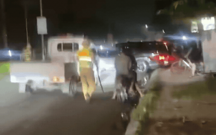 Video thấy chốt CSGT, tài xế quay đầu bỏ chạy, đổi người cầm lái - Ảnh 1.