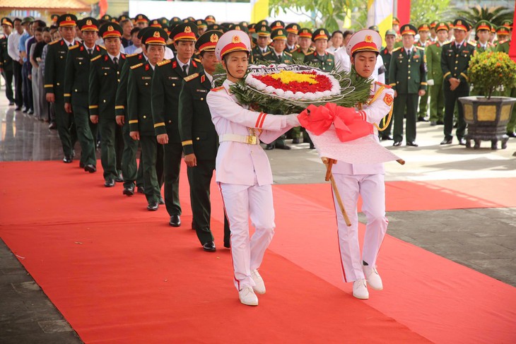 An táng 13 hài cốt liệt sĩ được tìm thấy tại khu vực Câu Nhi, Quảng Trị- Ảnh 1.