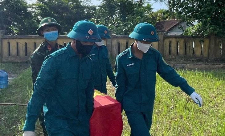Phát hiện ảnh chân dung người phụ nữ trong mộ liệt sĩ chưa xác định danh tính- Ảnh 2.
