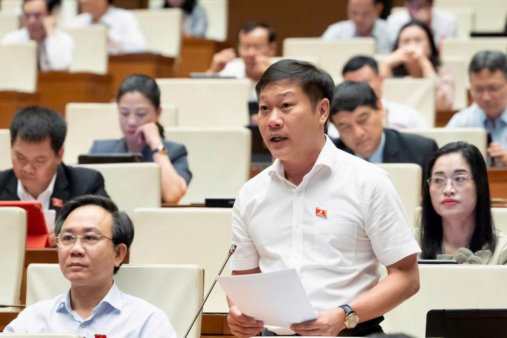 Đề xuất miễn trừ trách nhiệm cho ngân hàng khi báo cáo 'giao dịch đáng ngờ'- Ảnh 1.