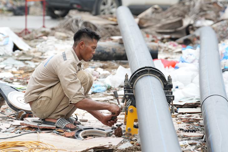 Loạt trụ cầu xuất hiện tại nút giao 'dị dạng' sau gần 10 năm - Ảnh 13.