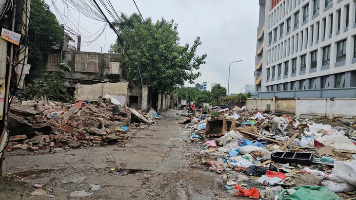 Cận cảnh tuyến Phạm Hùng - Lê Đức Thọ bắt đầu giải tỏa mặt bằng chuẩn bị thi công- Ảnh 3.