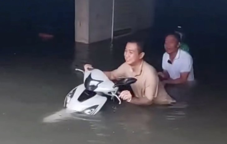 Xe bị ngập dưới hầm chung cư, người dân có được bồi thường?- Ảnh 1.