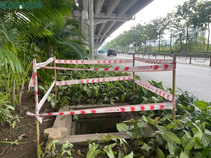 Hà Nội: Nhiều hố ga mất nắp trên đường Phạm Văn Đồng - Ảnh 4.